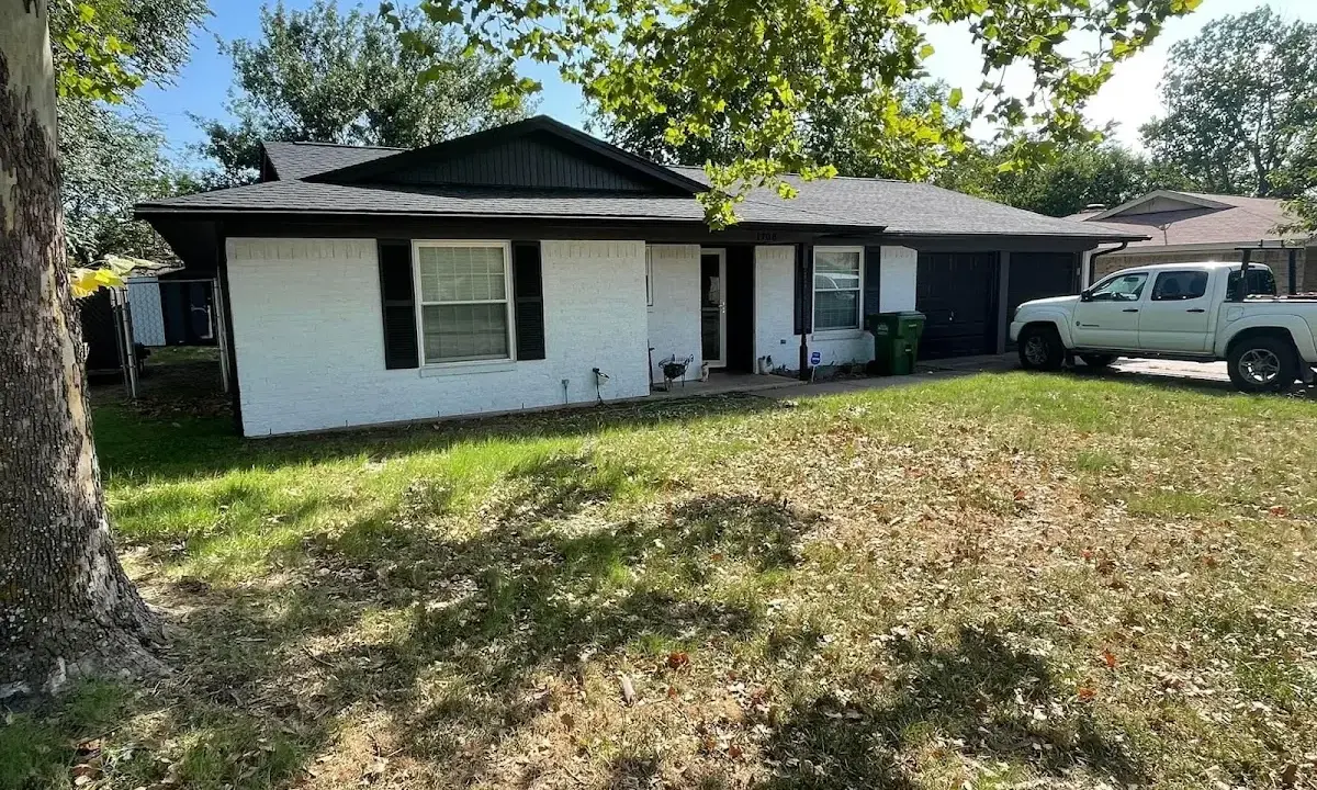 Professional roofing crew working on a residential roof in Perry Hall